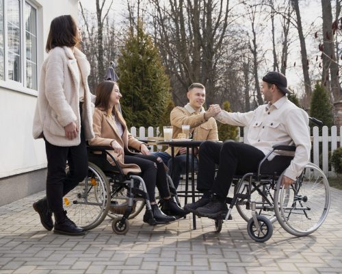 full-shot-disabled-friends-outside