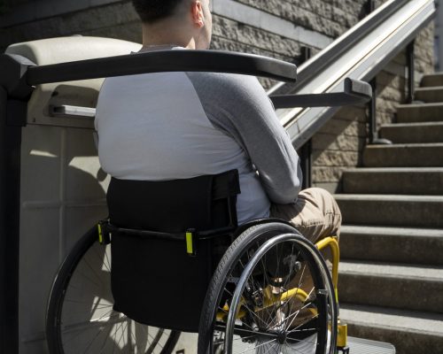 man-wheelchair-side-view